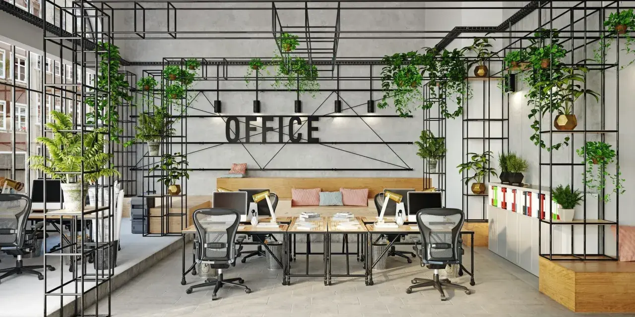 Espace de travail moderne avec beaucoup de plantes, idéal pour une sous location bureaux Paris.